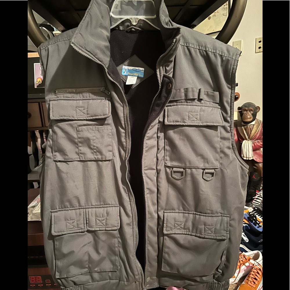 Outdoor vest with multiple pockets for anything outdoors use,Xxl but fits Xl too
